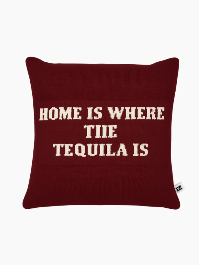 Brown cushion with writing