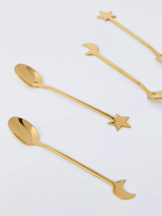Gold teaspoons with shapes on the end