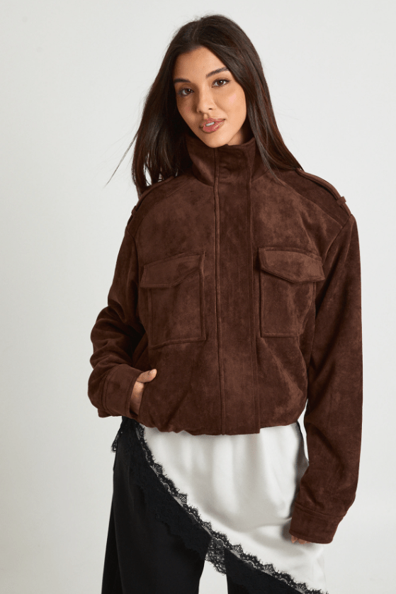 Female wears brown jacket