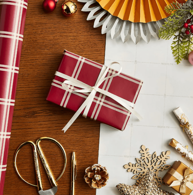 Red and white wrapping paper with white bow