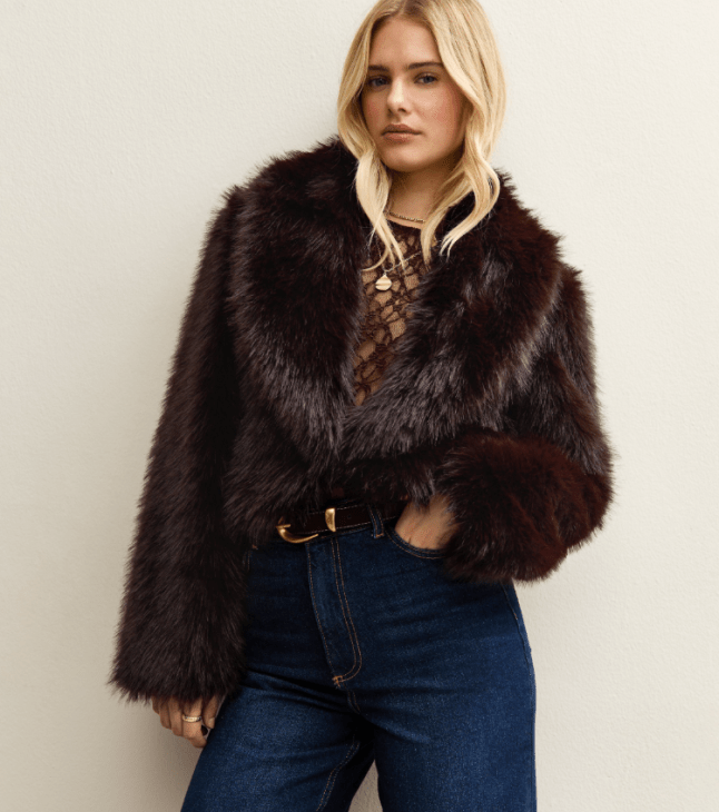 Female wears brown faux fur jacket