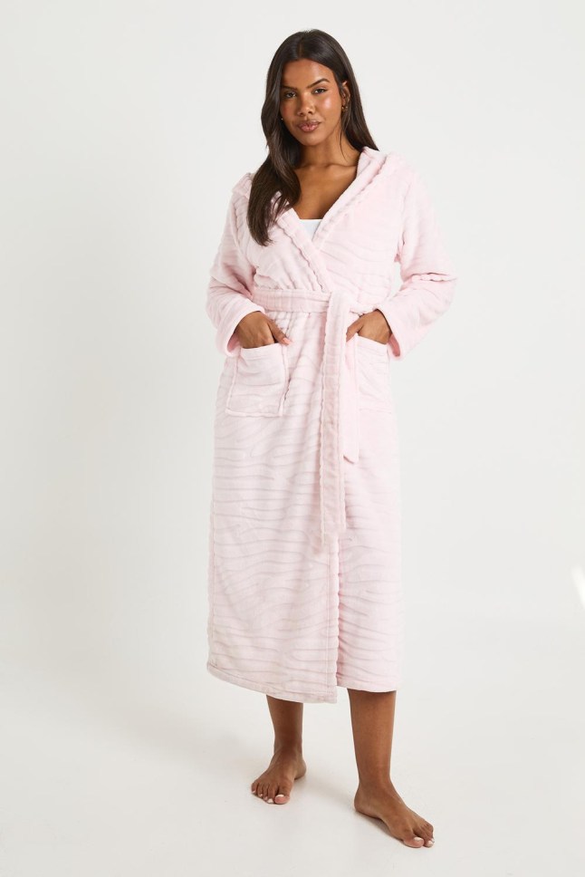 Female wears pink dressinggown