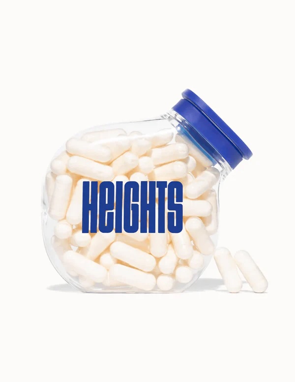 Bottle of white supplements