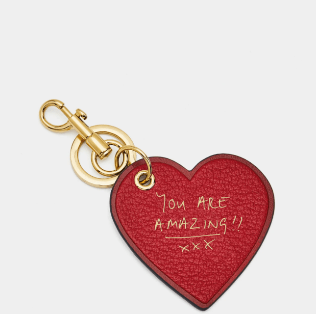 Bespoke Heart Charm from Anya Hindmarch with gold words printed on