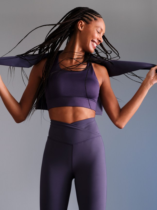 Female wears matching sports bra and leggings