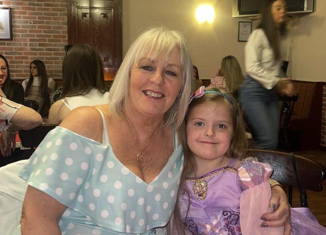 Lorraine McCorkindale and Stella-Lily wearing her favourite Rapunzel dress