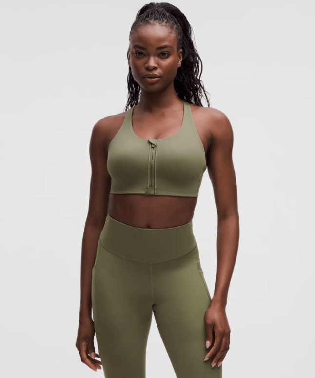 Female wears dark green sports bra