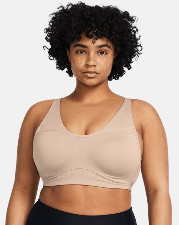 Female wears beige sports bra