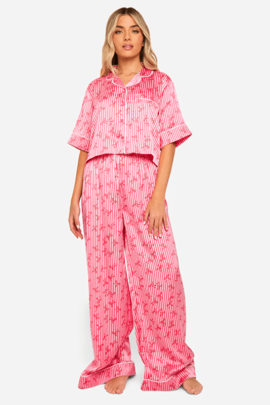 Female wears bow and stripe pjs