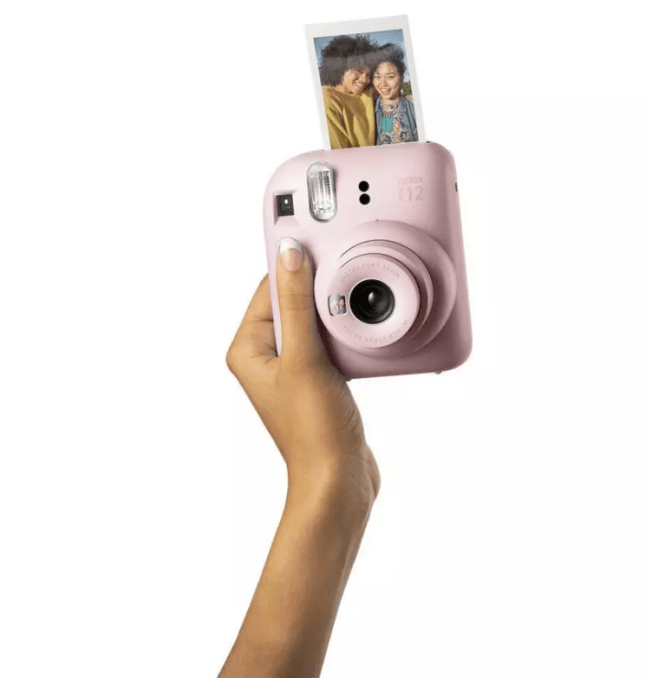 Hand holding digital camera