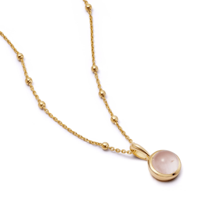 Gold necklace with pink crystal pendant