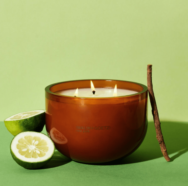 Large candle with opened fruit