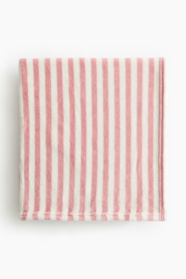 Pink and white stripe blanket
