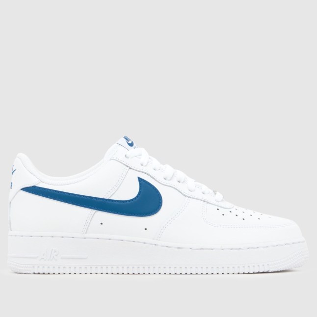 White trainer with blue tick by Nike on the side