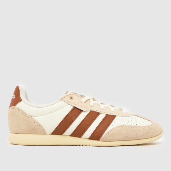 White/cream trainers with three red stripes