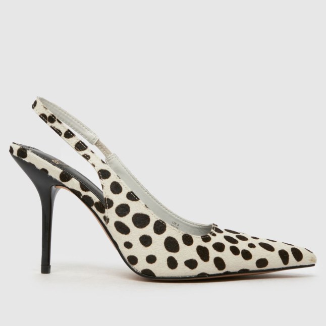 White animal printed shoe with black dots
