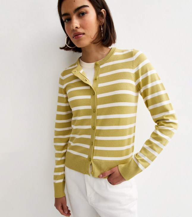 Model wears green stripe cardigan