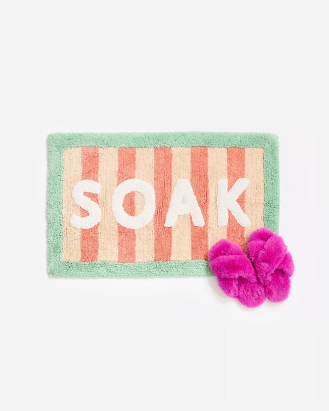 Slogan bath mat