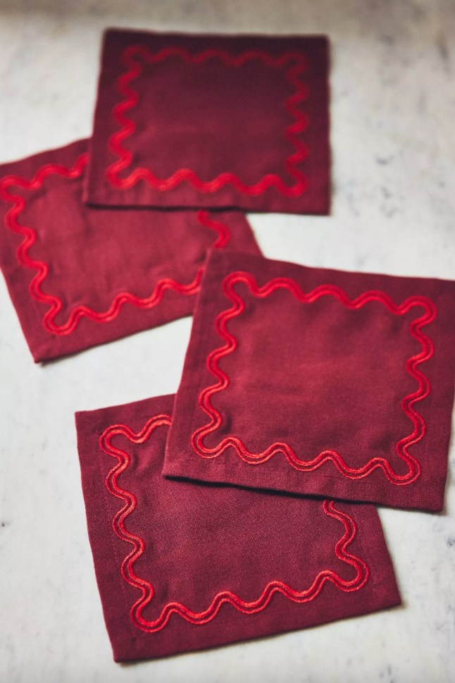 Red napkins with squiggly boarder