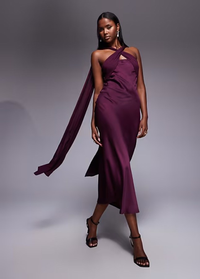 Female wears plum ASOS dress with neck tie
