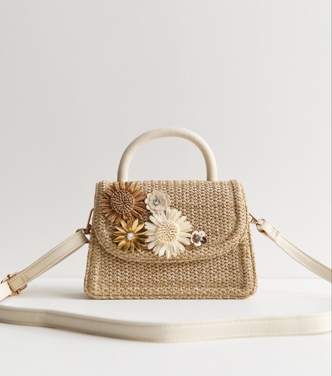 Beige woven bag with floral detailing