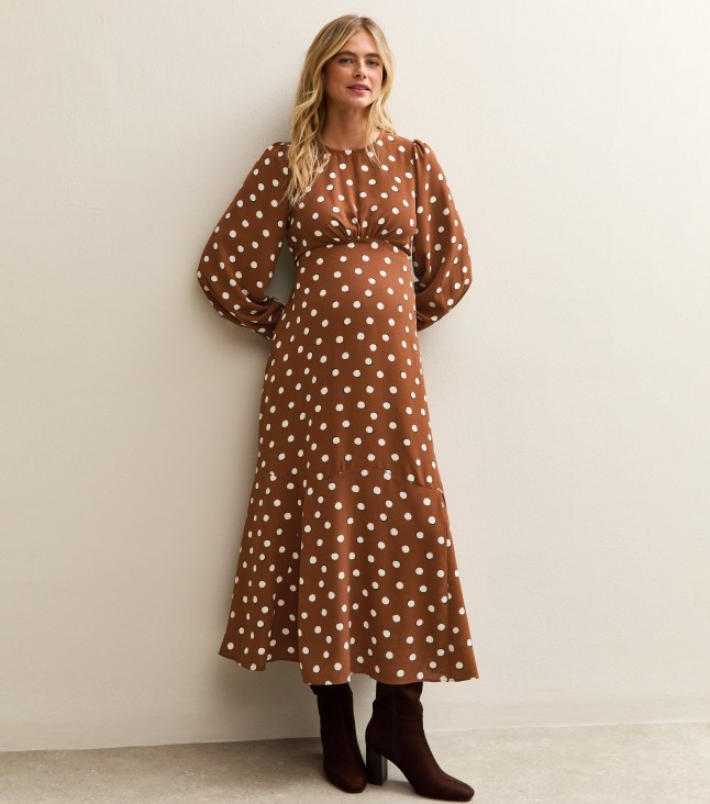 Female wears brown polka dot dress