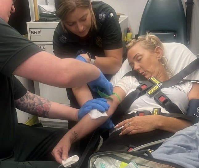 Michelle, in a diabetic coma, in an ambulance. // A woman who almost died after unknowingly injecting herself with "fake Ozempic" she bought on Facebook has revealed the telltale signs a weight loss jab is counterfeit. Michelle Sword, 47, first started taking weight loss jabs in 2020 after she put on two stone following the breakdown of her 20-year marriage. She bought her first pen of Ozempic containing semaglutide - which mimics a hormone in the gut that suppresses appetite and helps with weight loss - from a legitimate online pharmacy and within three months lost two stone, going down to her regular weight of eight stone and dress size 8. Coming off the jabs, the school receptionist maintained her weight loss by "exercising and eating healthier" until the summer 2023. Photo released 05/02/2026