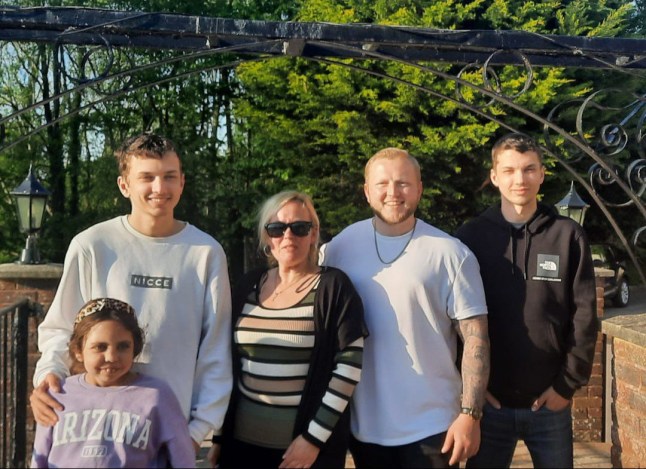 Story from Jam Press (Pregnant Hearing Cancer) Pictured: Stephanie with family. Brit pregnant mum?s hearing loss ?dismissed? as tinnitus but it was actually BRAIN TUMOUR A pregnant British woman has revealed that her hearing loss was ?dismissed? as tinnitus ??but it was actually a brain tumour. Stephanie Hilliard had also experienced balance issues as well as facial numbness. As her condition only worsened, she sought out a second opinion; especially as she was seven months along at the time. She went for an MRI scan which revealed a slow-growing benign meningioma, which medics believed had been there since her late teens. Even though it wasn?t cancer, the diagnosis still posed a series of risks. ?When I was told I had a brain tumour, I was in complete shock,? the mum-of-four, from Axbridge, Somerset, told NeedToKnow. ?I was heavily pregnant [at the time] and had three children at home who needed me. ?My first thought wasn?t about myself, it was about them. ?I was terrified of what the diagnosis meant for my baby and whether I would be there for my children as they grew up. ?It was the most frightening time of my life.? Stephanie was ?forced? to undergo brain surgery, which came with a series of caveats. Although it would potentially clear the tumour, it could cause permanent loss of hearing, sight, mobility and even death. She gave birth to her daughter, Lily, and went ahead with the procedure. Due to the location of the tumour, surgeons were only able to remove 60% of it to avoid life-altering damage. And her recovery wasn?t an easy task, either. She had to relearn to eat, drink and dress all while caring for her family and newborn. Around four years after the ordeal in 2013, it was found that the tumour had started to grow again. Despite further radiotherapy, Stephanie still lives with the brain tumour and its associated impacts. Each day, she battles with balance issues, fatigue and other ?hidden disabilities?. It?s also meant that she?s had to give up work for good and is now a full-time carer for her daughter. The 50-year-old said: ?Living with a brain tumour means living with constant uncertainty. ?You never know what?s around the corner, and that fear never really goes away.? To help raise funds for vital research, she?s taking on the challenge to walk 10,000 steps each day throughout February for Brain Tumour Research. She added: ?I?m taking on the 10,000 Steps A Day challenge because fundraising is absolutely vital. ?Without it, research simply can?t continue. ?Walking helps me stay positive, focused, and reminds me that I?m doing something meaningful, not just for myself, but for my children and for everyone affected by brain tumours.? Letty Greenfield, Community Fundraising Manager at Brain Tumour Research, said: ?Stephanie?s story highlights just how devastating a brain tumour diagnosis can be, not only for the individual, but for their entire family. ?Supporters like Stephanie are crucial in helping us fund research to find kinder treatments and better outcomes for all those affected by this disease, and getting us closer to the day when a cure is found.? ENDS EDITOR?S NOTE: All press are kindly requested to mention Brain Tumour Research somewhere in the copy and digital press are requested to include a link: https://braintumourresearch.org/pages/10-000-steps-a-day?utm_source=Banner_10k_Steps_Tracked_Link&utm_medium=Banner_10k_Steps_Tracked_Link&utm_campaign=Banner_10k_Steps_Tracked_Link&utm_id=Banner_10k_Steps_Tracked_Link&utm_term=Banner_10k_Steps_Tracked_Link&utm_content=Banner_10k_Steps_Tracked_Link