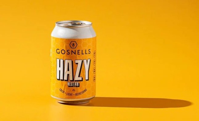 A can of Gosnells Hazy Nectar on a yellow background
