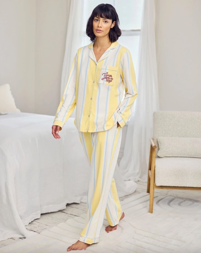 Female wears blue and yellow stripe pjs