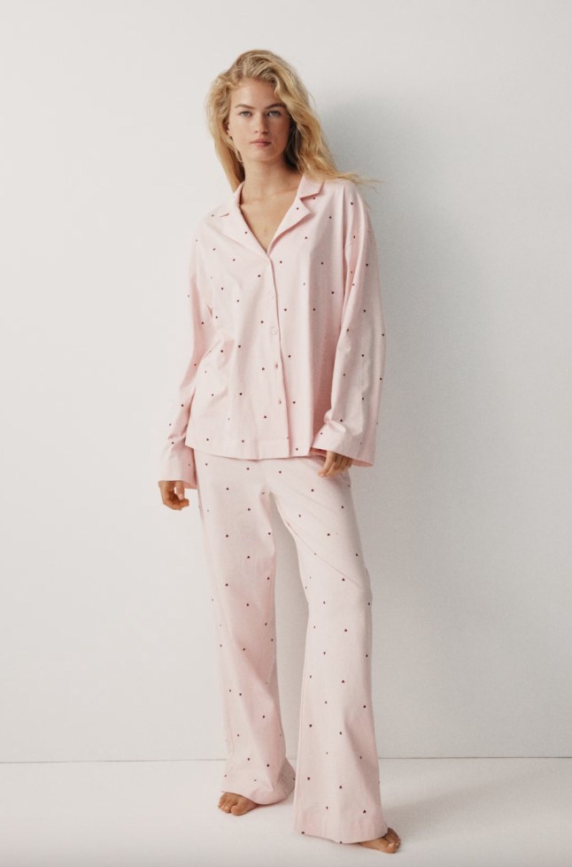 Female wears pink pjs