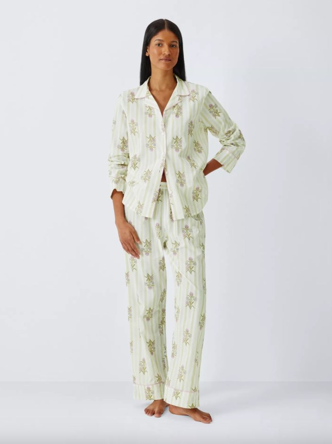 Female wears pale green patterend pjs