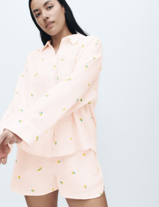 Female wears pastel matching pj set with floral design
