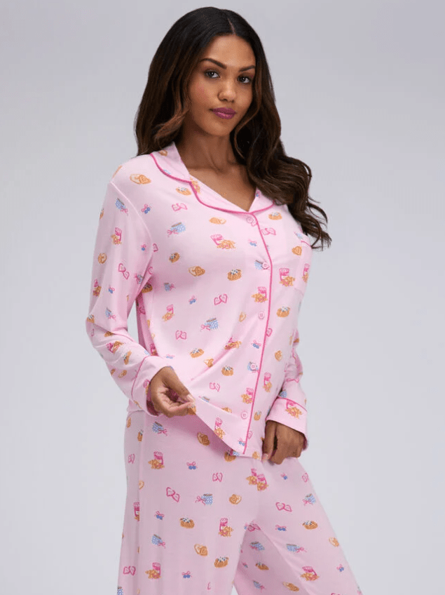 Model wears pink printed pjs